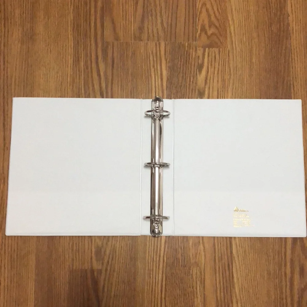 Lot of 3 white 3 ring binders